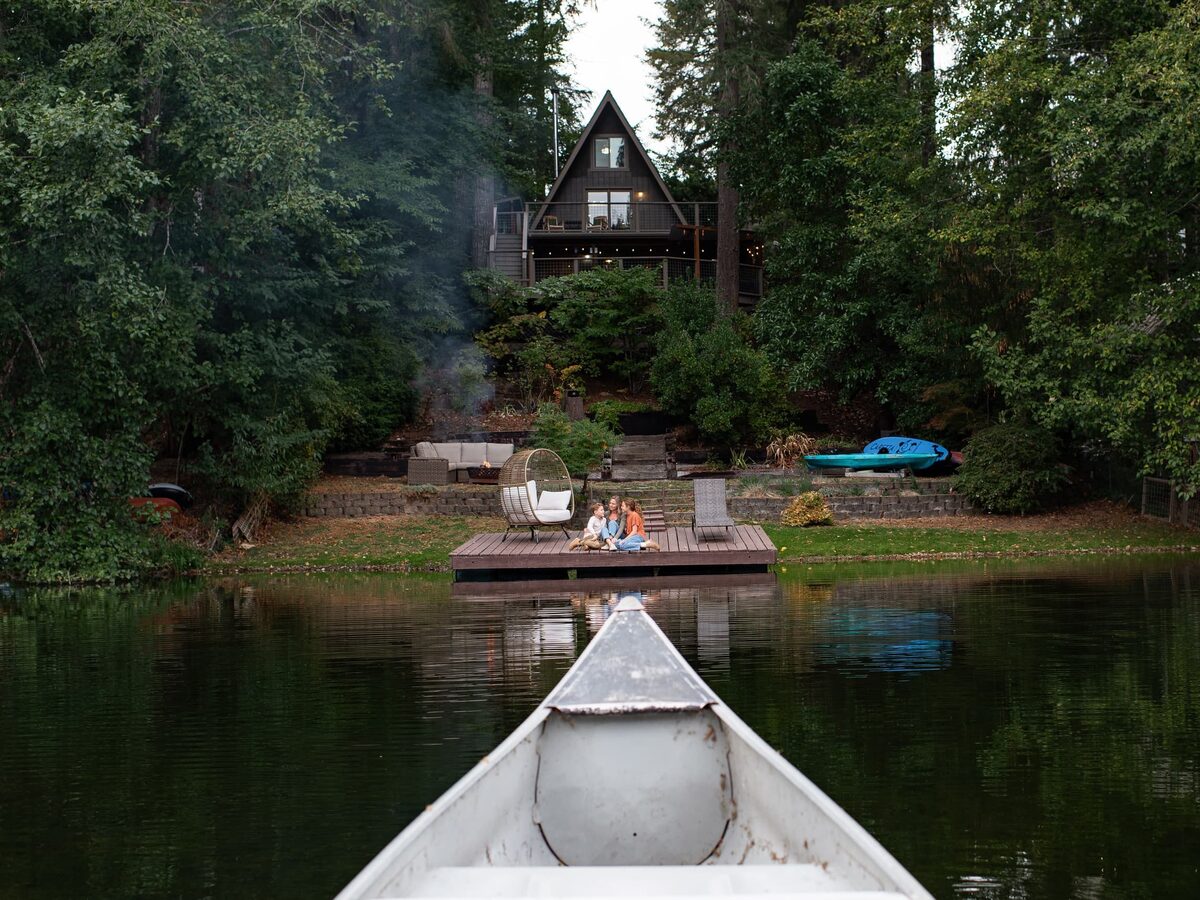 Paddling the canoe back across Lake Minterwood toward the cabin and dock