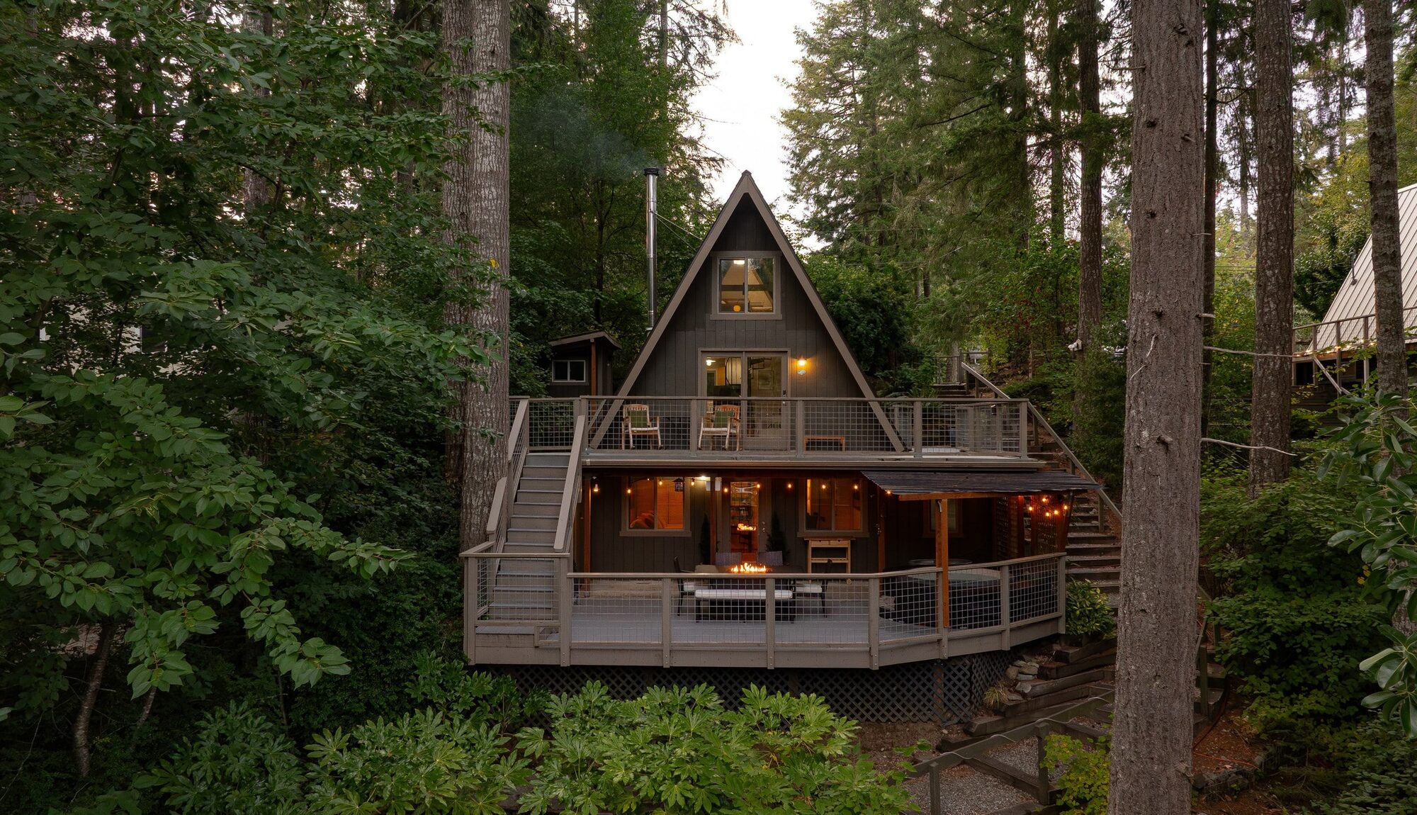 The Minterwood Revival A-frame cabin on the shore of Lake Minterwood in Gig Harbor, Washington